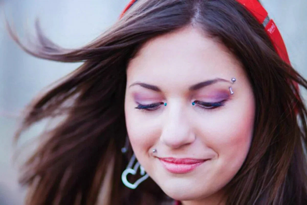 Woman with beautiful eyebrow studs