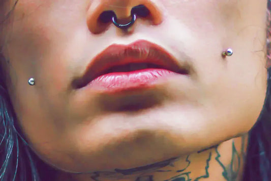 A man looks good with a lip ring.