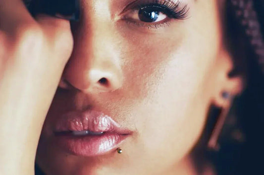 Women wearing pierced jewelry