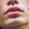 A man looks good with a lip ring.