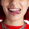 lip piercing is nesting or embedding