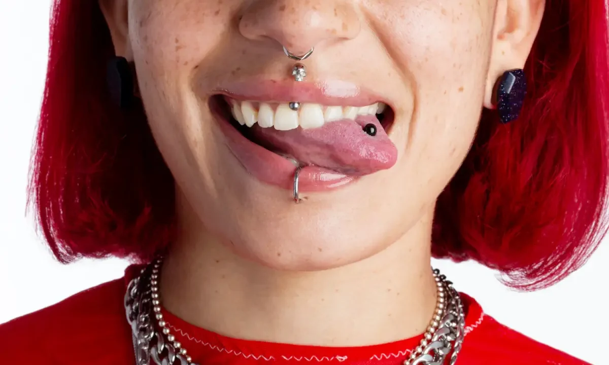 lip piercing is nesting or embedding